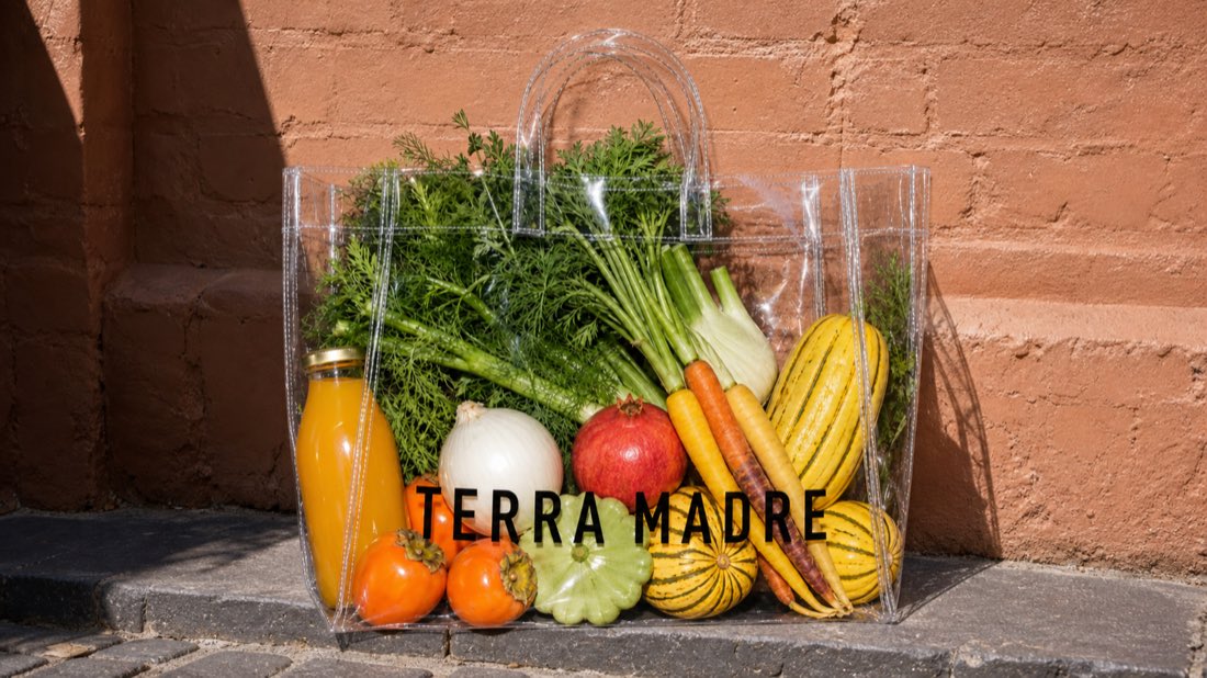 A Terra Madre bag on a laneway step